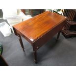 A 19th century mahogany Pembroke table on turned legs, 72 x 91 x 91cm open