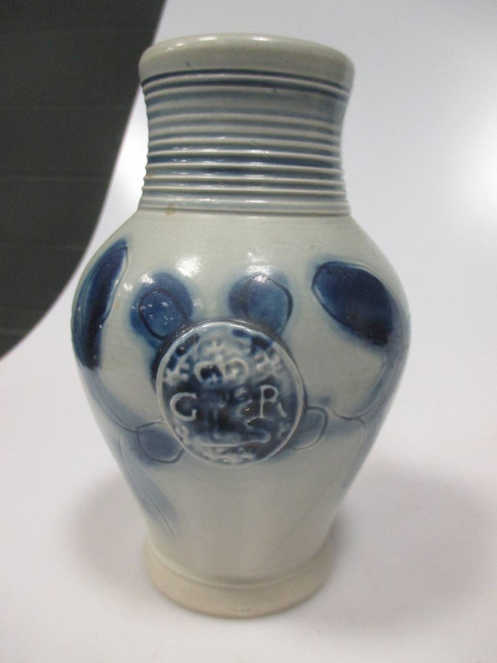 An 18th century Staffordshire commemorative jug, the ovoid scratch blue decorated body moudled in - Image 4 of 4