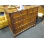 A George III elm chest of drawers with original handles, quarter reeded pilasters, 102cm wide