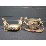 A pair of Amphora figural vases