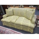 A modern two-seater sofa in yellowed green damask fabric 180cm wide