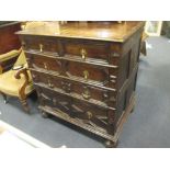 A 17th century oak chest with geometric drawer fronts, 96 x 91 x 62cm