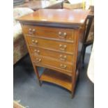 An Edwardian mahogany four drawer cabinet on tapering legs, 92 x 53 x 38cm