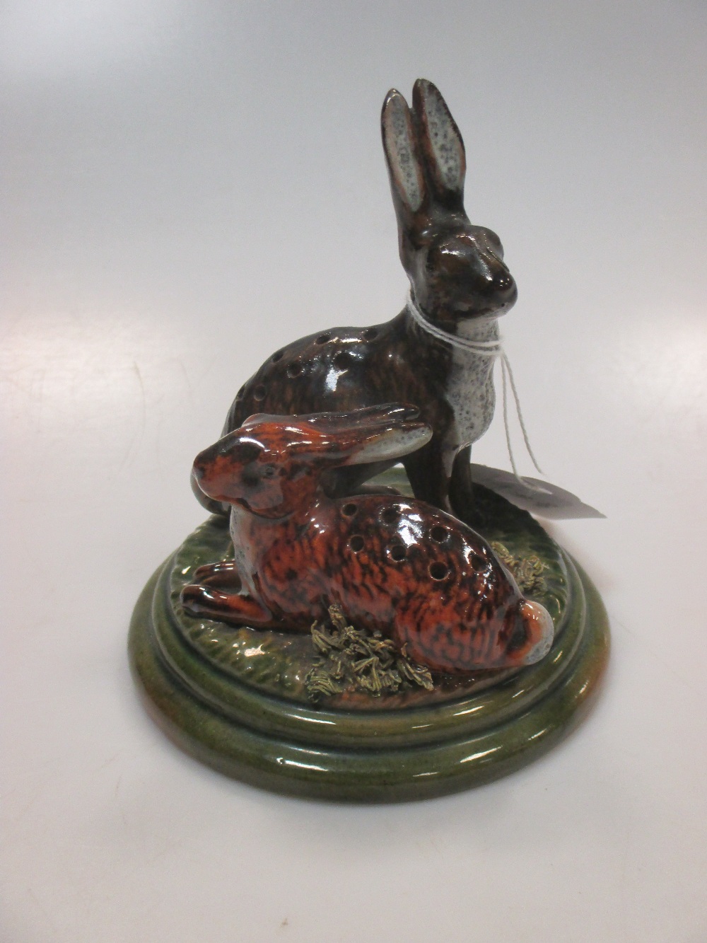Pottery hares pin holder