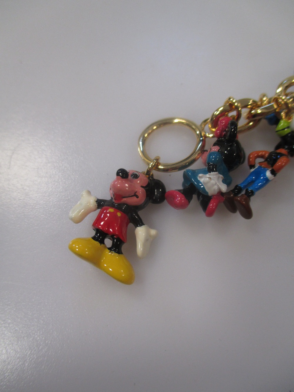 A 24ct Gold Plated Ultimate Disney Classic Charm Bracelet Featuring 37 Disney Characters - Image 2 of 3