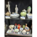 A large quantity of mixed Asian ceramics to include blanc de Chine, a ginger jar, a teapot etc