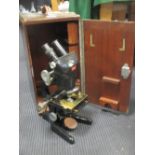 A W. Watsons & Sons Bactil microscope (cased)