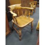 A late Victorian or Edwardian turned frame captains chair