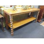 A Victorian oak serving table with undertier and barley twist columns, 86 x 183 x 48cm