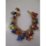 A 24ct Gold Plated Ultimate Disney Classic Charm Bracelet Featuring 37 Disney Characters