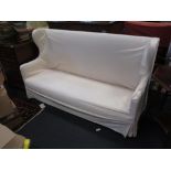 A sofa with white loose cover, 160cm wide