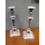 A set of four silver plated candlesticks (4)