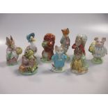 A collection of Beswick Beatrix potter figures, 9 figures with gold oval backstamp c1955-72 to