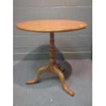 A 19th century oak tilt top tripod table, 75 x 74cm wide