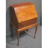 A 1950's walnut lady's bureau, 96 x 54 x 41cm, together with an Edwardian mahogany three-tier