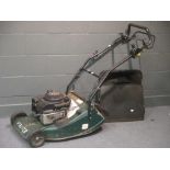 A Hayter 650 series petrol pedestrian mower with collection box and roller