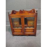 A wall hanging tobacco cabinet and a rosewood work box (2)