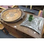 Two rustic wooden bowls and a fossil dish