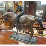 After Bonheur, a large bronze model of a horse and jockey