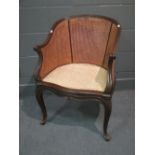 A French style 19th century caned bergere elbow chair