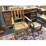 A 19th century stained wood child's armchair -possibly Scottish and an elbow chair