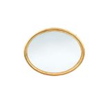 A large late 18th century oval gilt frame wall mirror, 95 x 122cm (37 x 48in)