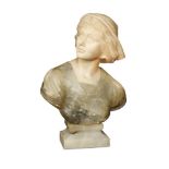 A late 19th century marble and alabaster bust of a young woman, her gown laced to the front, mounted