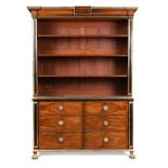 A Regency rosewood bookcase in the manner of John McLean, with brass mounted cornice, ebony