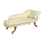 A Regency chaise Longue, circa 1815, with scroll end, upholstered in a striped and floral printed