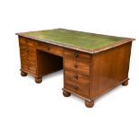 A George IV mahogany pedestal partners desk in the manner of Gillows, with gadroon moulded border,