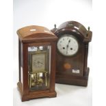 An Edwardian mahogany mantel clock, and an anniversary clock