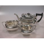A silver three piece tea set by Walker and Hall, Sheffield 1931/1924, 41.7ozt gross (3)