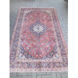A Kashan rug 245 x 150cm