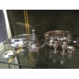 Five silver sweetmeat dishes, two silver tea strainers & stands, a silver toast rack, a pair of