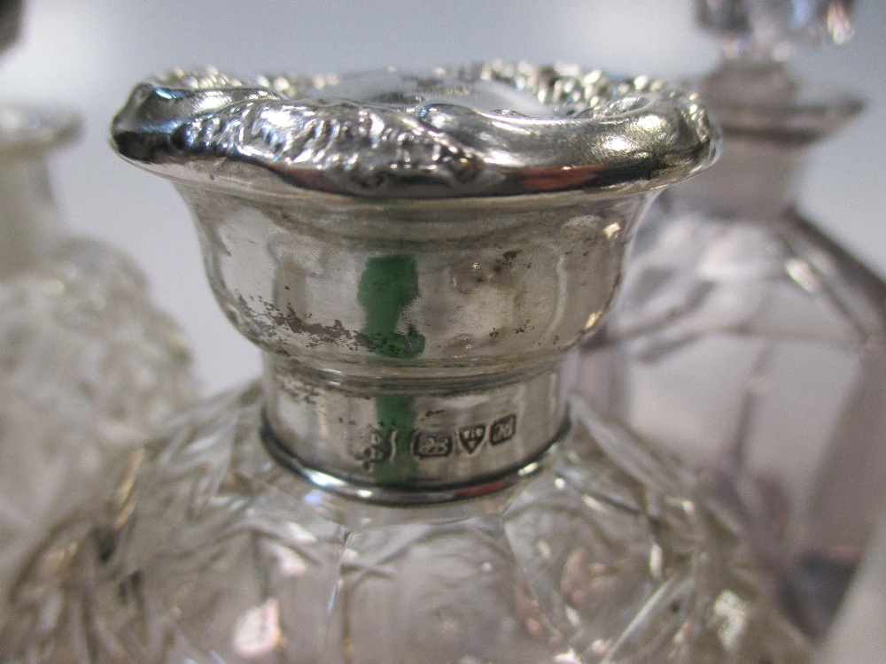 A collection of cut glass scent bottles, three with silver collars (13) - Image 3 of 3