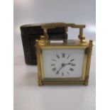 A cased brass French carriage timepiece, later platform escapement