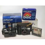 A Halina 'Zippy F' Disc 102 camera, boxed, a Canon 'Sure Shot' instamatic camera, cased, an