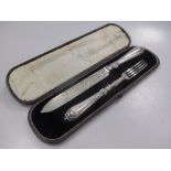 A cased silver serving knife and fork