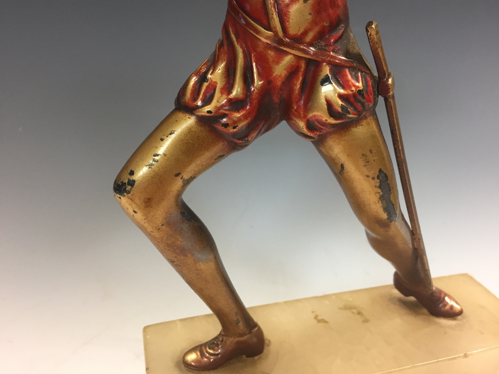 An Art Deco cold painted figure of a female fencer, standing en garde, mounted to an onyx plinth - Image 5 of 9