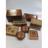 A collection of wooden boxes to include tea caddy, writing desk etc