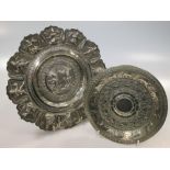 An Asian silver embossed dish and a small decorated dish