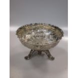 A collection of silver plated items including standing dishes, cutlery and bonbon dishes, in a
