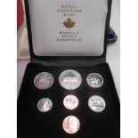 A quantity of commemorative and other coinage, medallions including a lady's wristwatch marked gucci