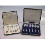 A cased set of six silver teaspoons together with a cased set of silver coffee spoons, 3.8ozt