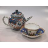 An 18th century Imari teapot, together with a Meisson teacup & saucer (4)