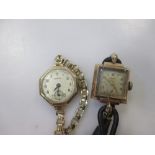 Two 9ct gold lady's wristwatches, one on a leather strap, the other on a gold plated bracelet