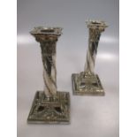 A pair of plated silver candlesticks, approx 19.5cm high (2)