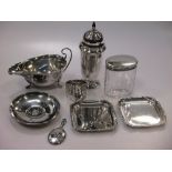 A modern silver sugar bowl, caster, small trays, lidded jar and napkin ring, 16oz.