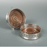A Pair of George III silver bottle coasters, makers mark erased, London, probably 1809, straight