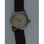 Rolex - A mid-size steel 'Oyster' wristwatch, circa 1952, the signed circular cream coloured dial,